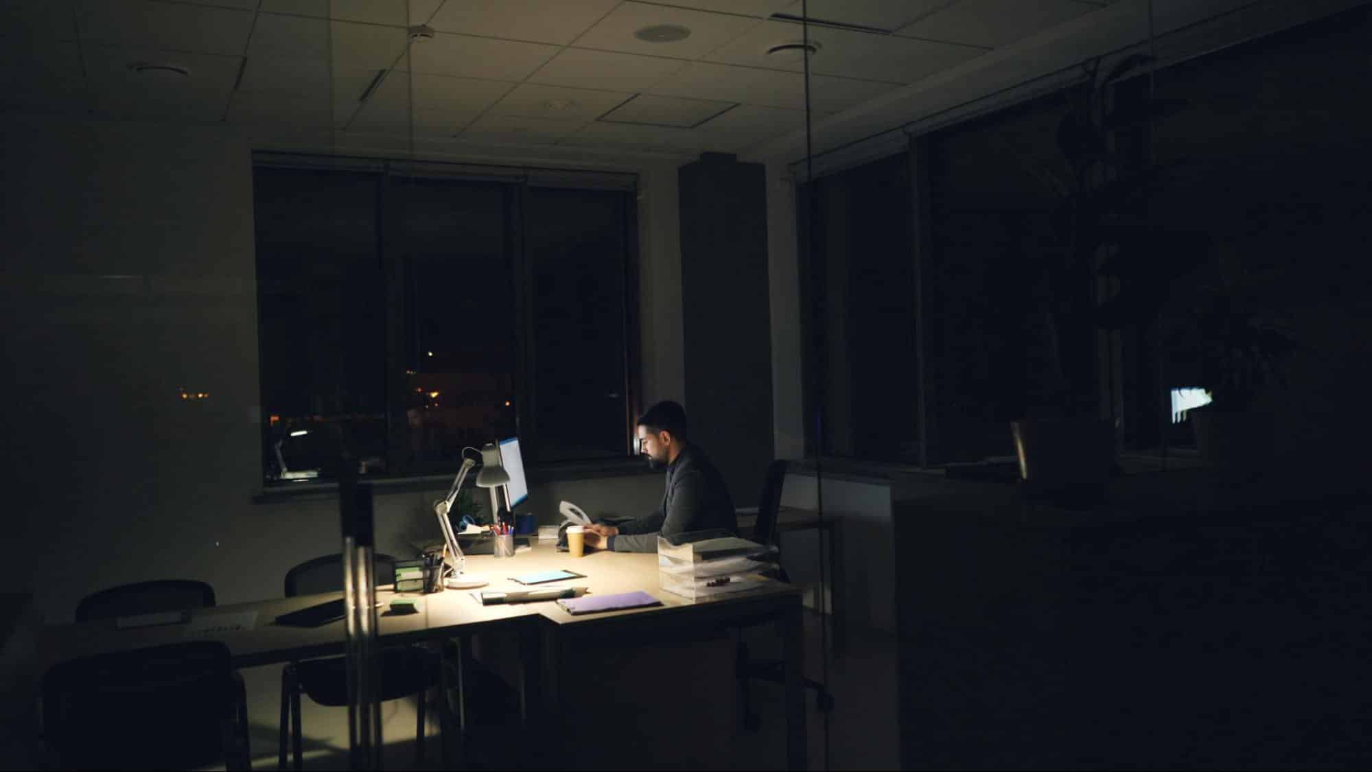 Dedicated professional working late in the office.