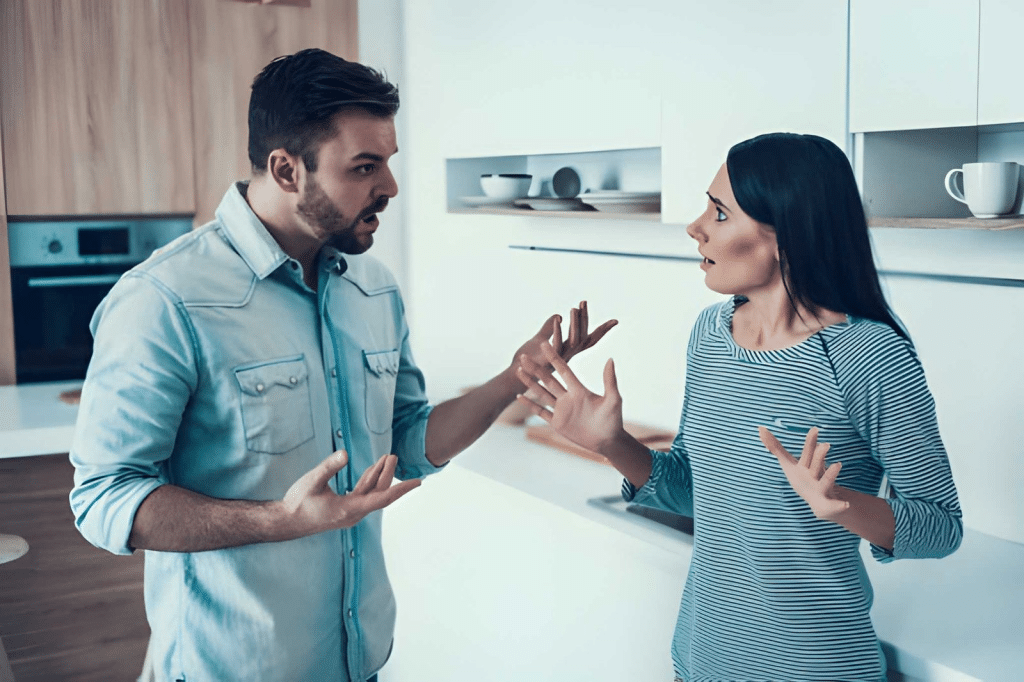 Couple having a disagreement in the kitchen