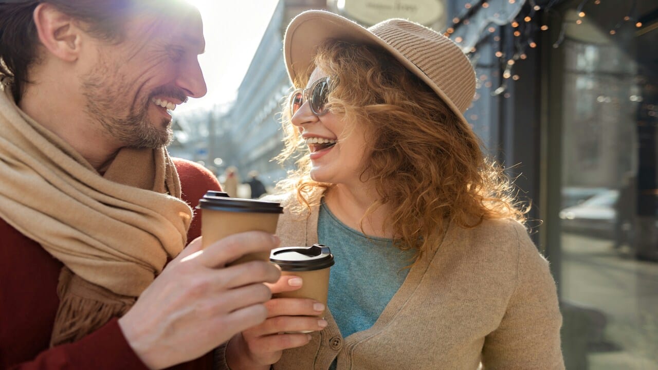 A mature couple having coffee together