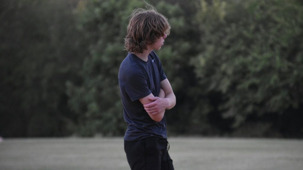 A man standing in a field.