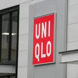 A photo of Uniqlo's emblem on a building.