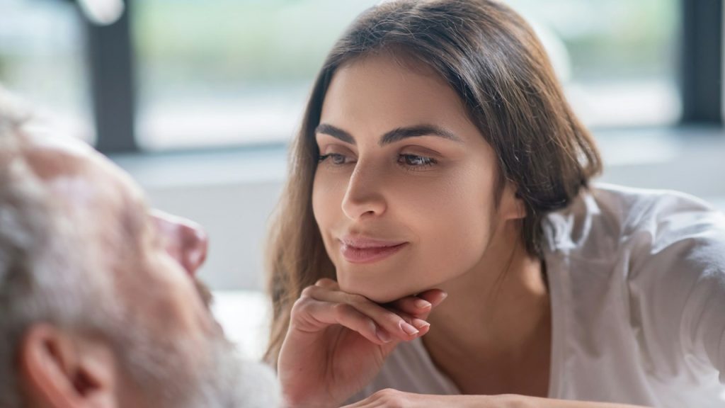 A woman looking at her husband with love.