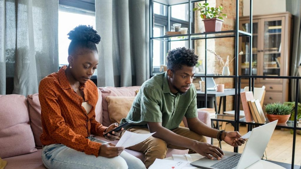 A couple managing home finances together.