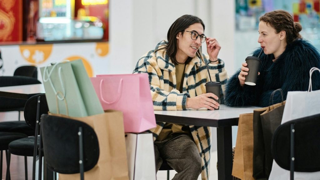 A couple having coffee after shopping.