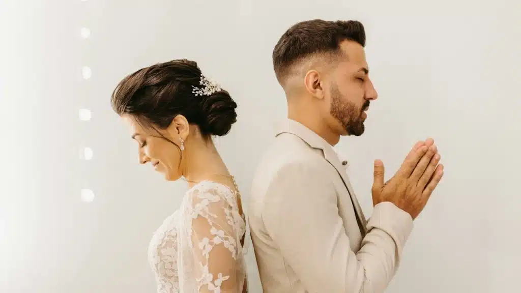 A man and a woman standing next to each other.