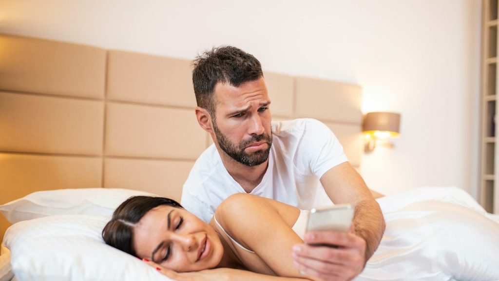 Jealous husband spying on his wife's phone
