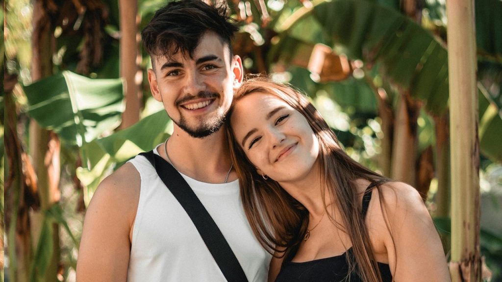 A man and woman posing for a picture.