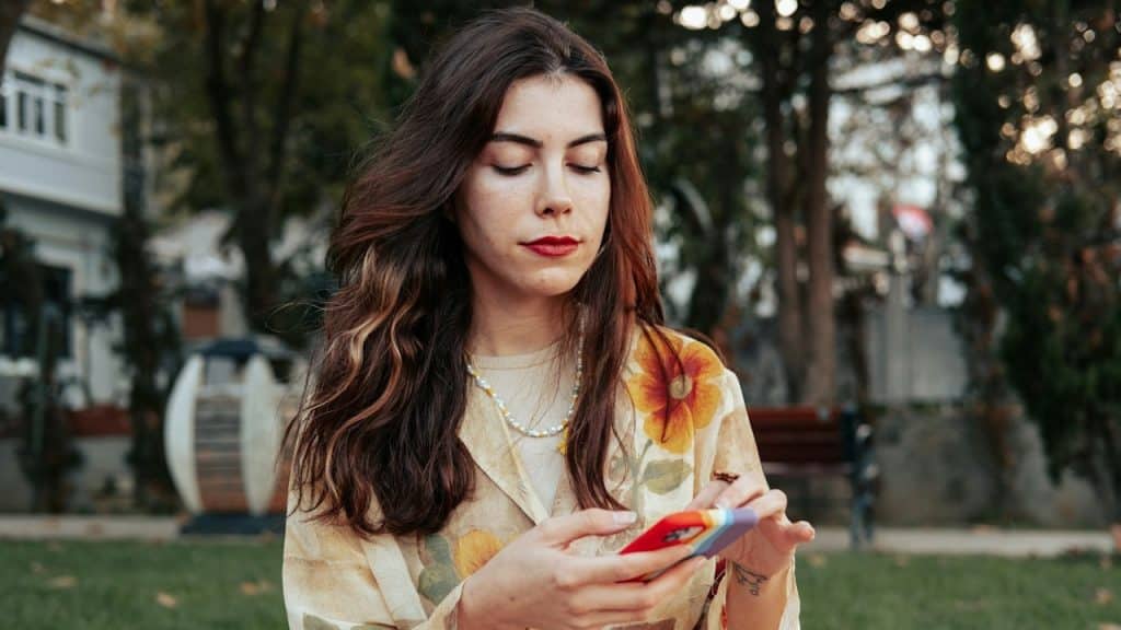 A lady watching phone intensively