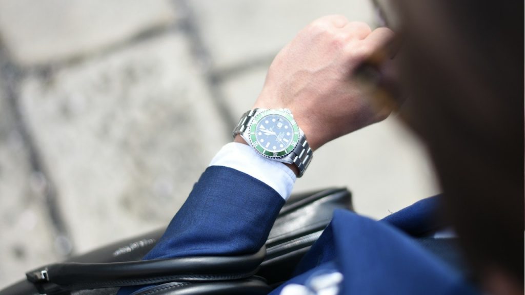 A man wearing a wrist watch.