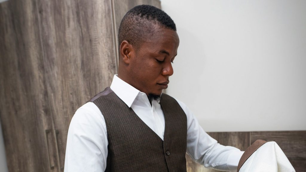 A man wearing a comfortable two-piece dress.