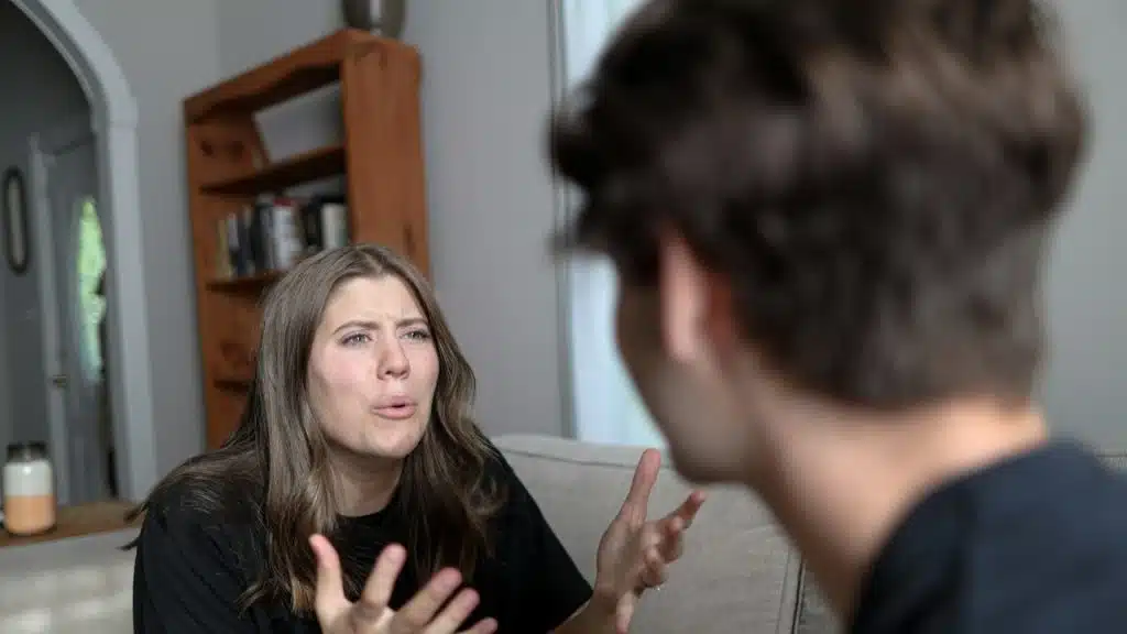 A woman complaining to her husband about his behavior.