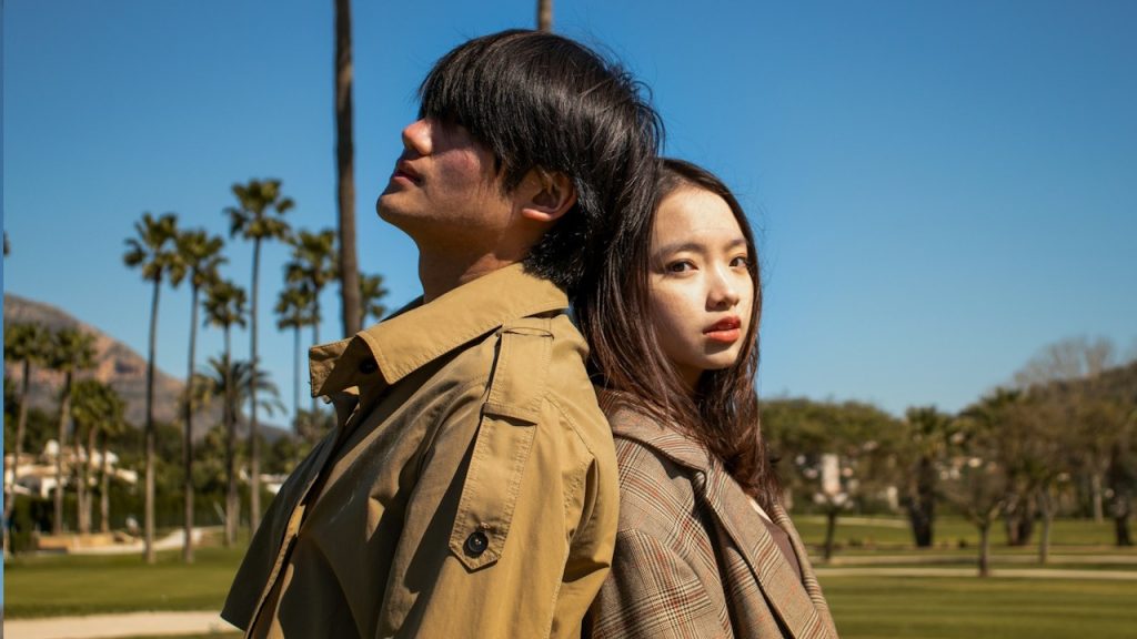 A man and woman standing together.