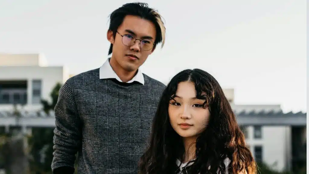 A man and a woman posing for a picture.