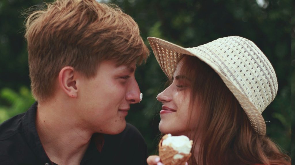 A man and woman eating ice cream.
