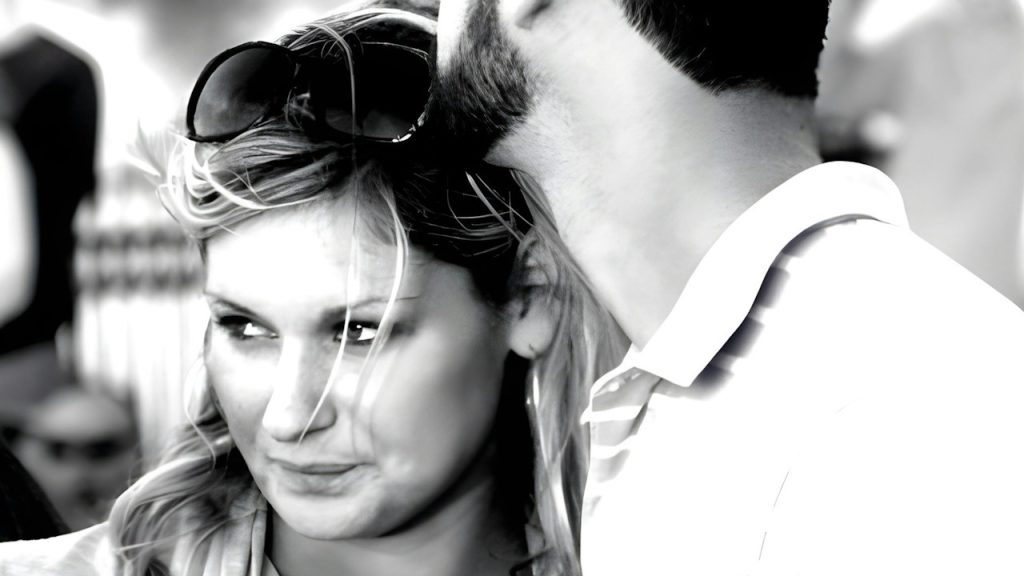 A man and a woman standing next to each other.
