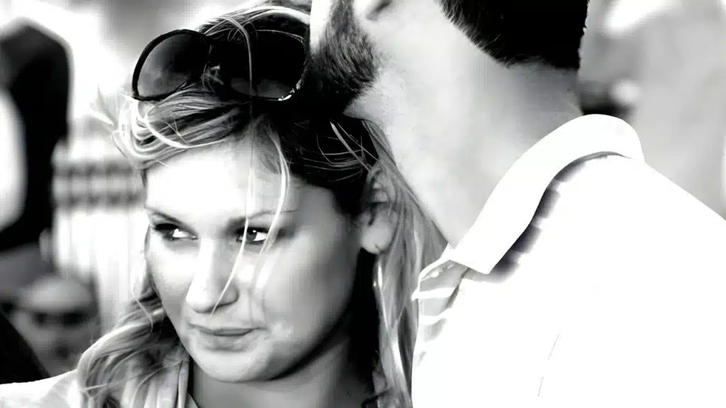 A man and a woman standing next to each other.