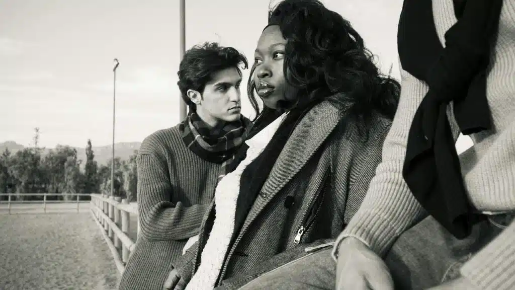 A man and a woman looking away from each other.