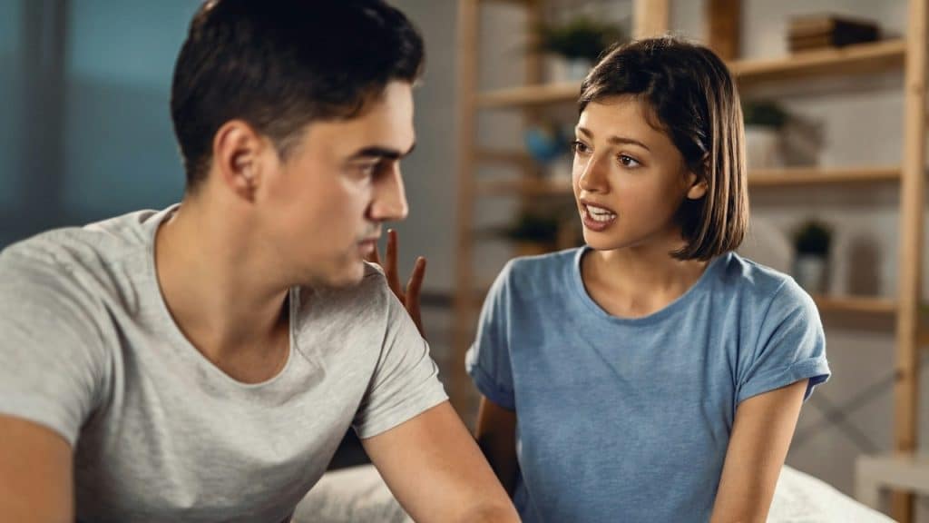 A woman arguing with a man.