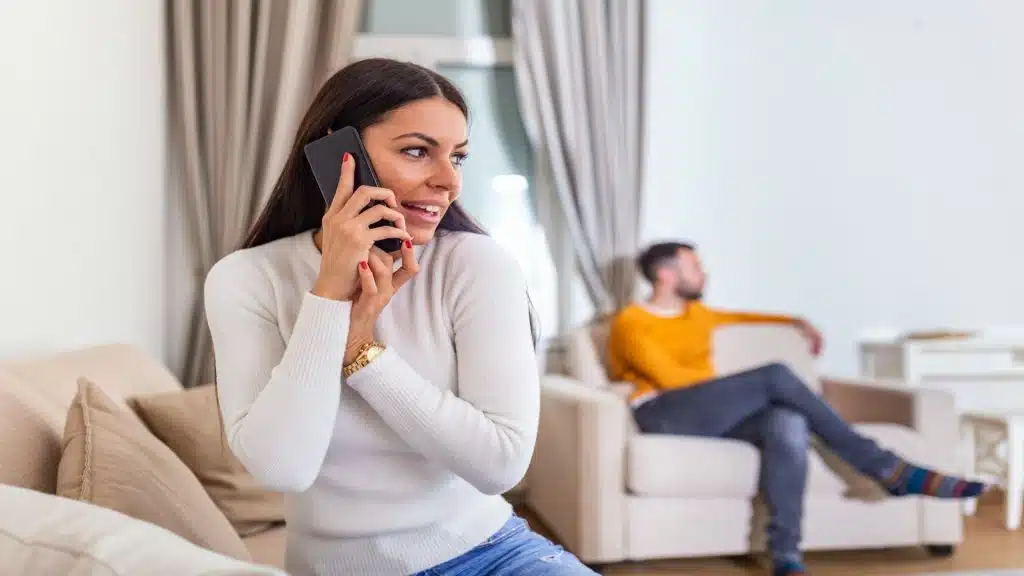 person waiting while partner is distracted