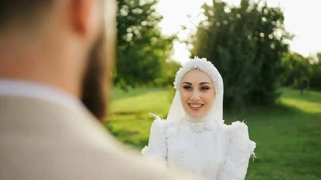 A woman is looking at a blurred man in the foreground