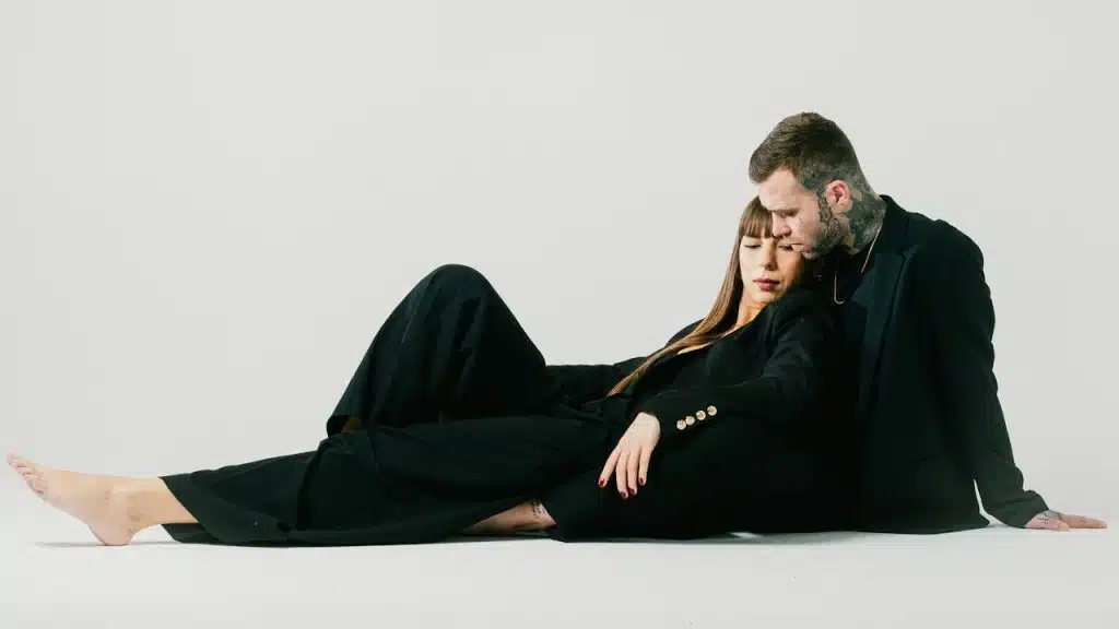 Women Lying On The shoulder of a man