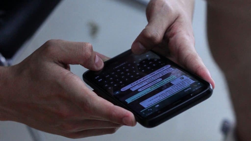 A man texting.