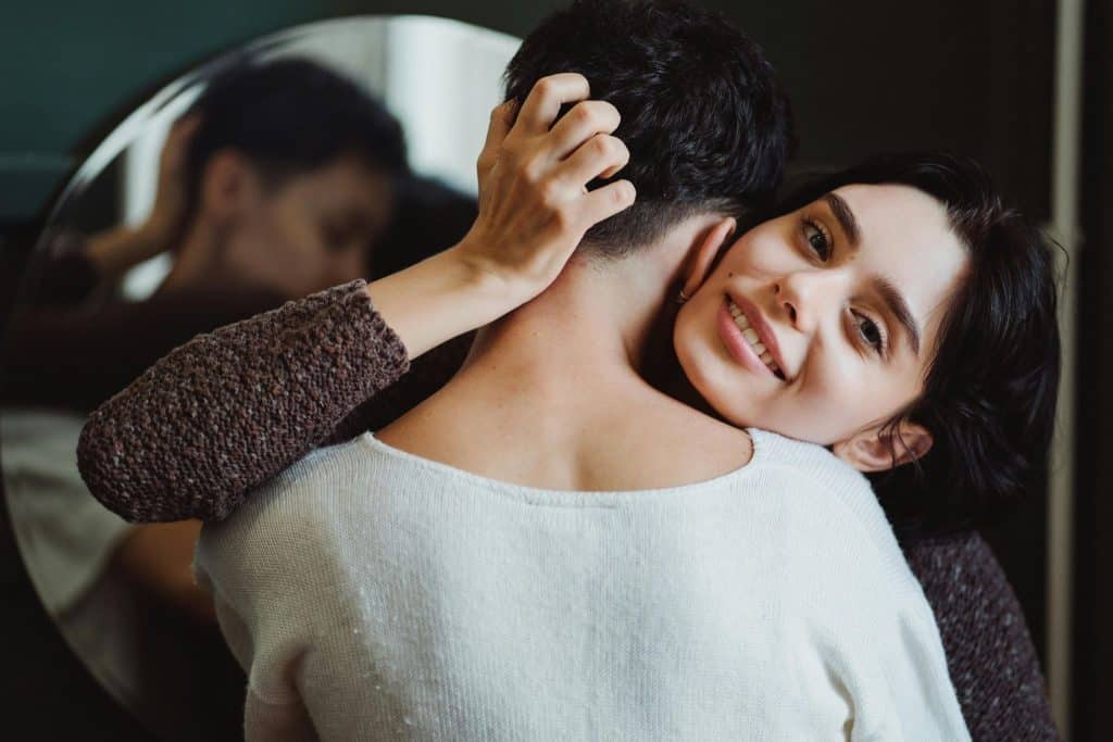 Woman acting affectionate one moment and distant the next