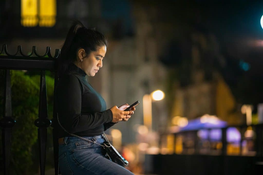 Woman sending late night message for attention