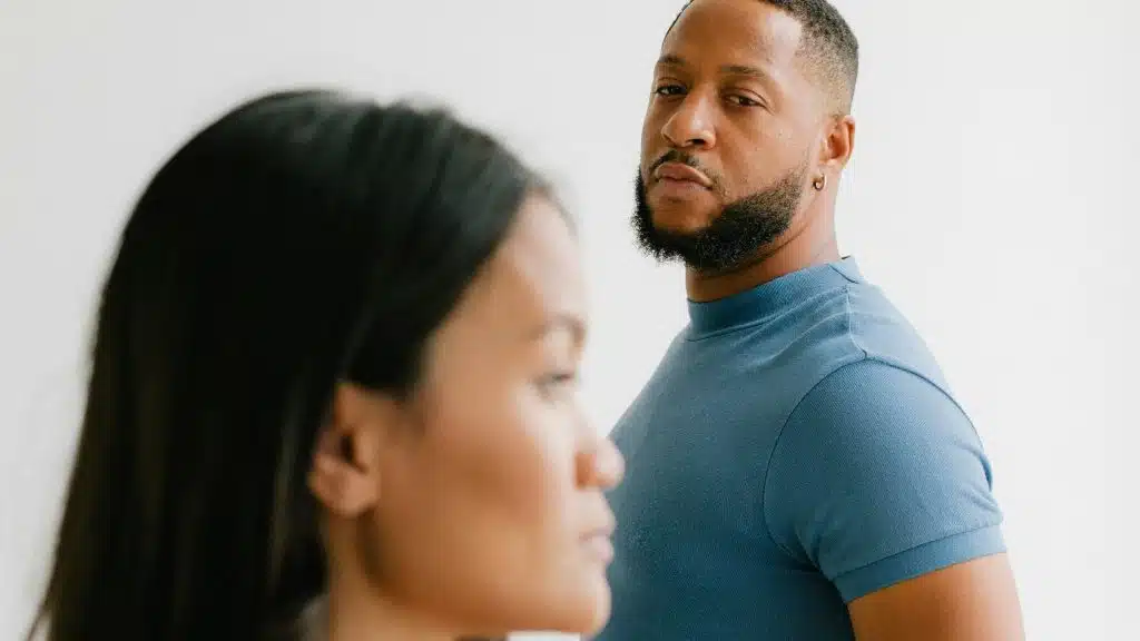 A man looking at the woman