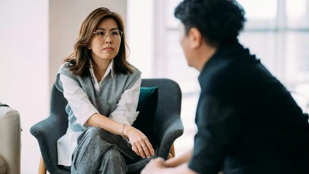 A man and woman talking