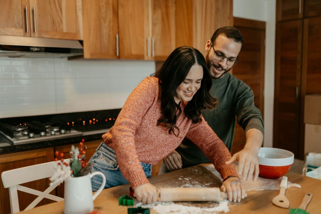 A man and woman at the kitchen