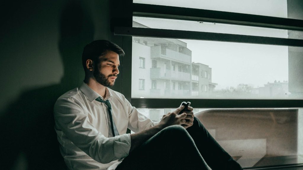A man looking at his phone
