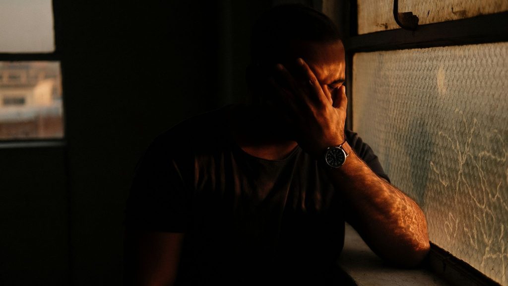A man in the dark room
