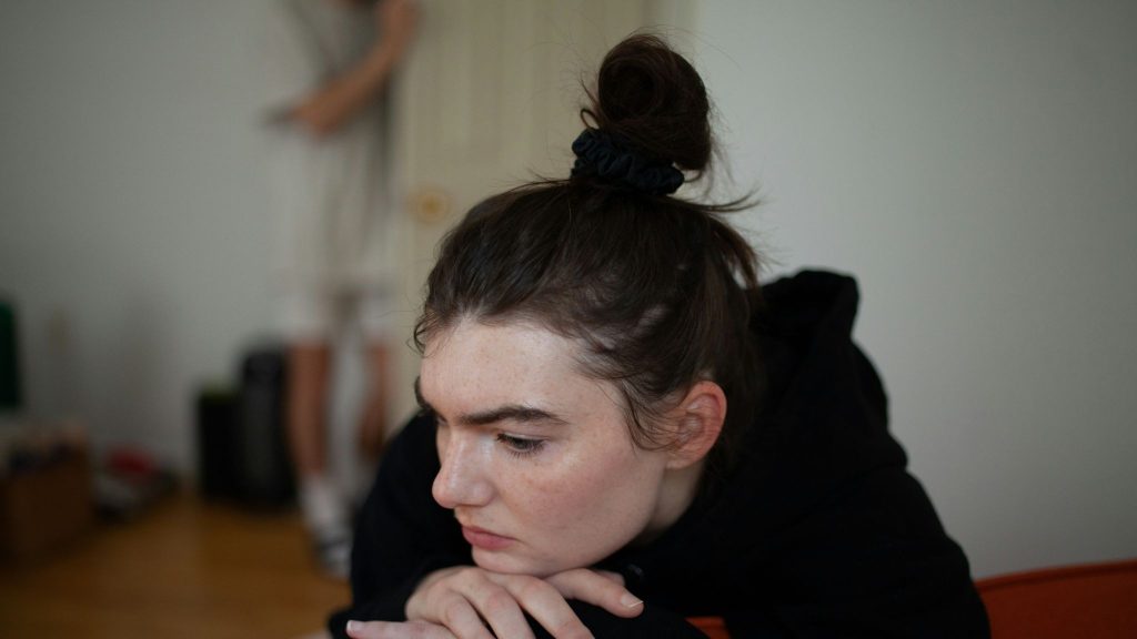 Sad woman on the sofa