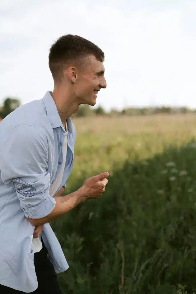A man smiling genuinely.