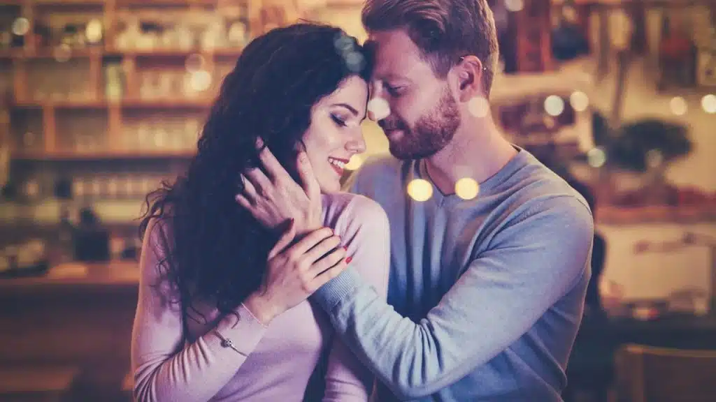 A beautiful couple dating in a cafe.