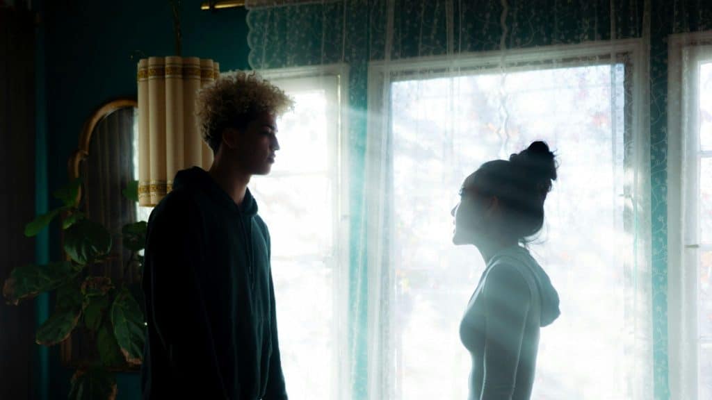 A man and woman talking