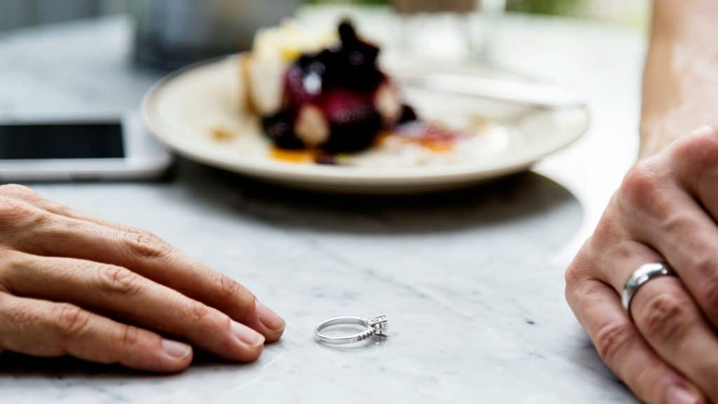 Woman removing her ring