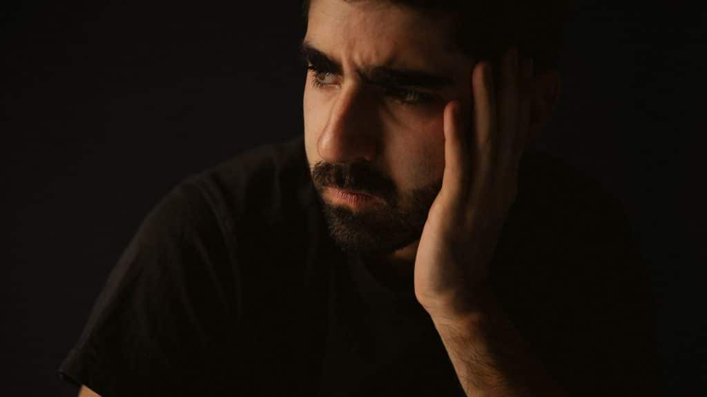 A man with an angry expression