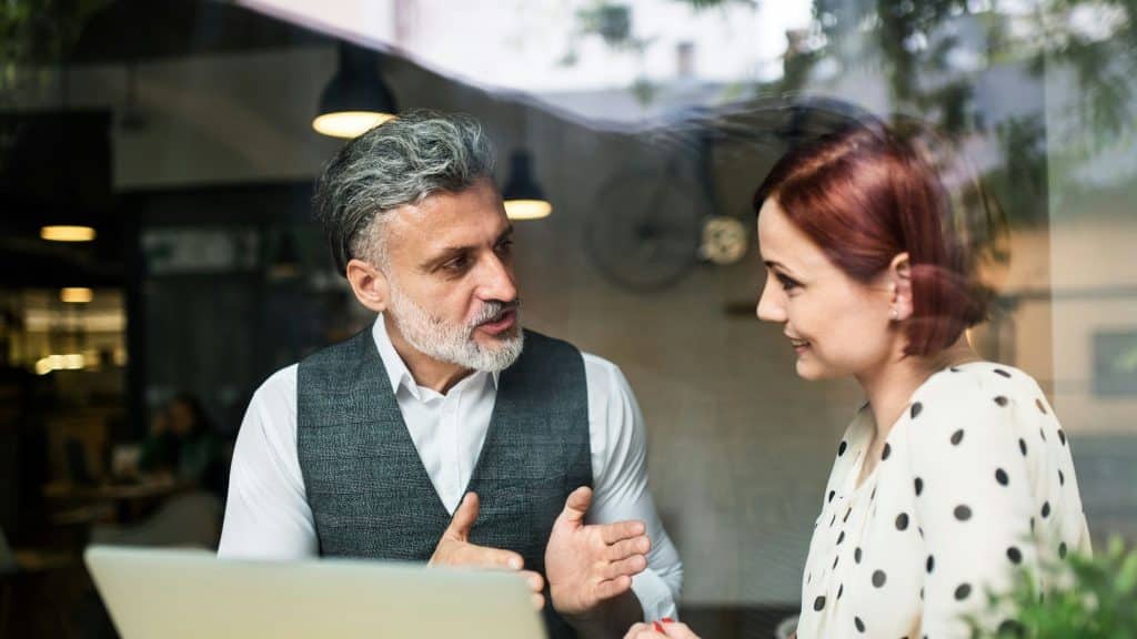 A man and woman talking