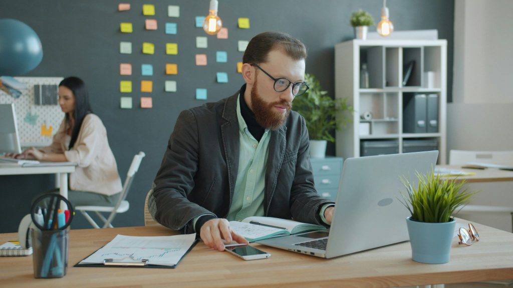 A man and woman working