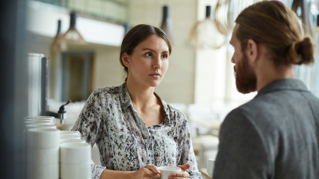 A man and woman looking at each other