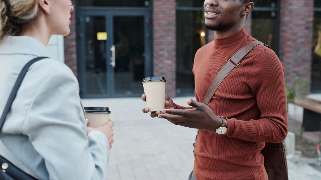 A man talking to woman
