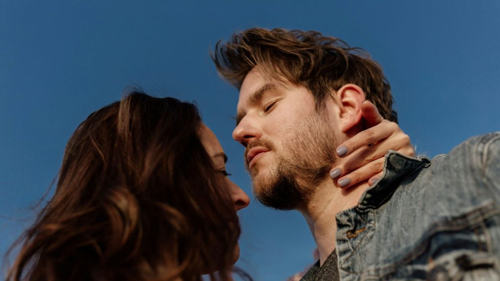 A man and woman close to each other