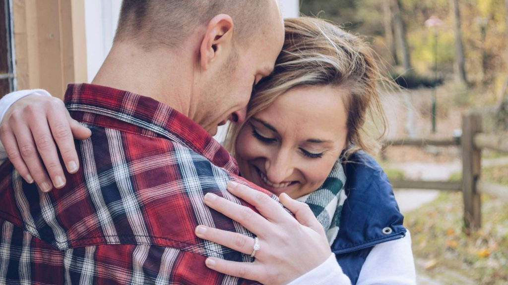 Woman hugging a man